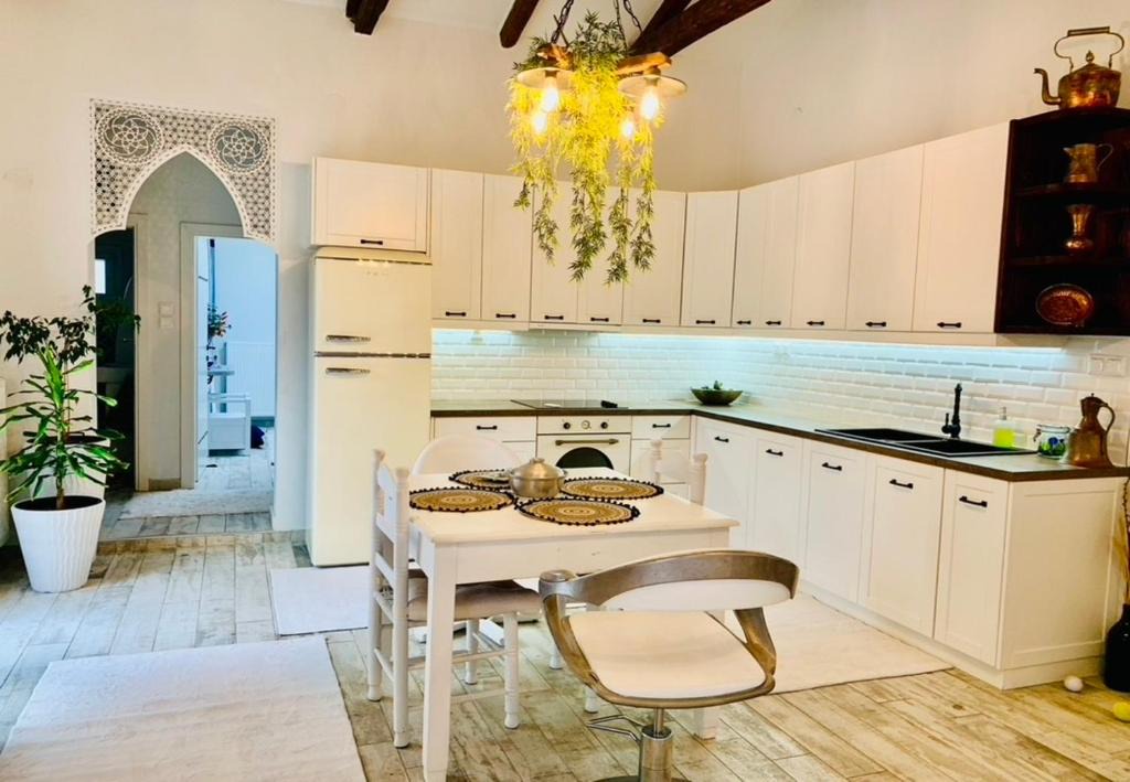 Volos Villa | 1922 Epoch Harmony Oikia Cozy Ethnic Chic Retreat