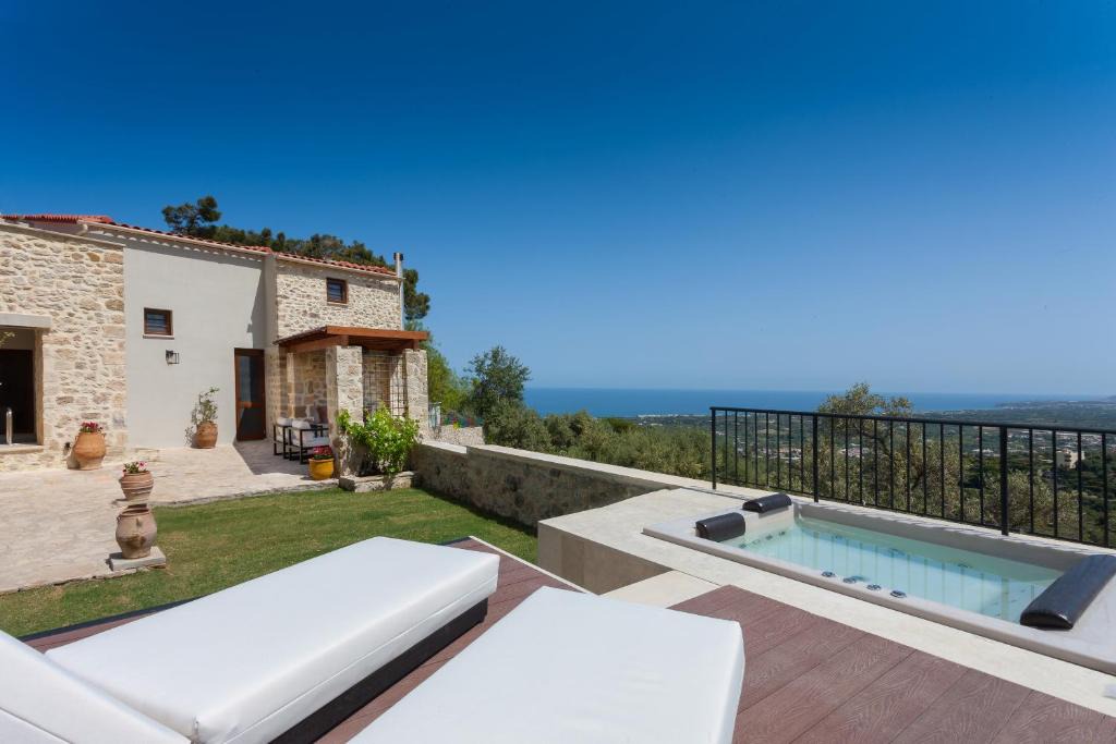 Maroulas Villa | Ali Vafi's Villa - Heated Jacuzzi & Indoor Pool by Rentado
