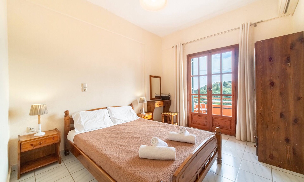Lakones Apartment | Apartment Arianna 11 with Sea View, Shared Pool & Wi-Fi