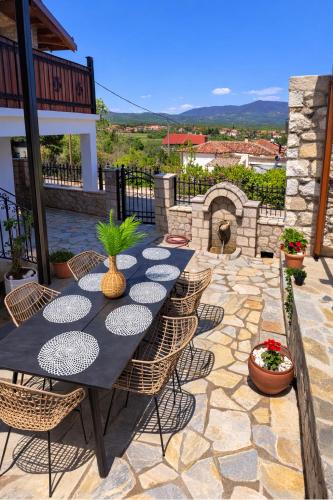 Kefalochori Villa | Archontiko Kastellia - Stone Guesthouse with Fireplace and Mountain View
