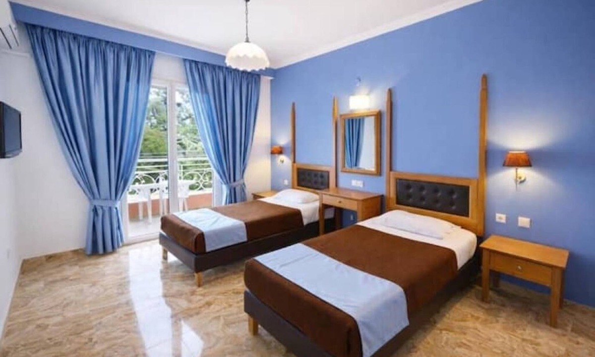 Achilleio Hotel | Cozy Coastal Hideaway at Irene Apartments – Steps from Agios Gordios Beach