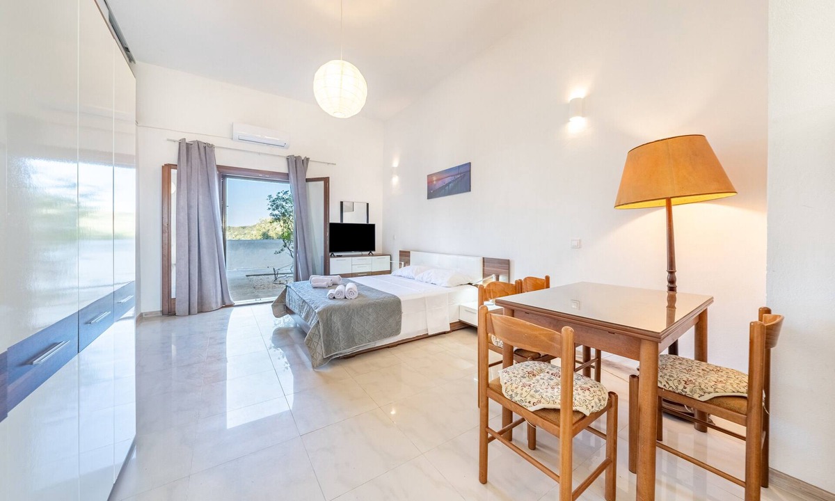 Dafnata Apartment | Melissa apartment - stunning sea views, large garden and parking