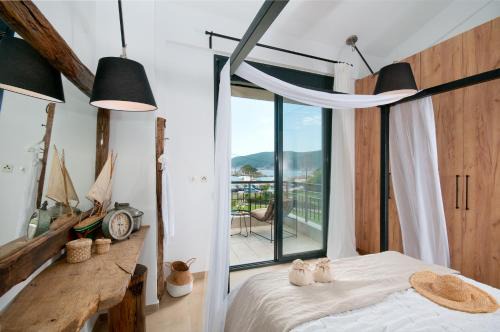 Kalamitsi Villa | Seathon SeaFront Beach Villa in Kalamitsi