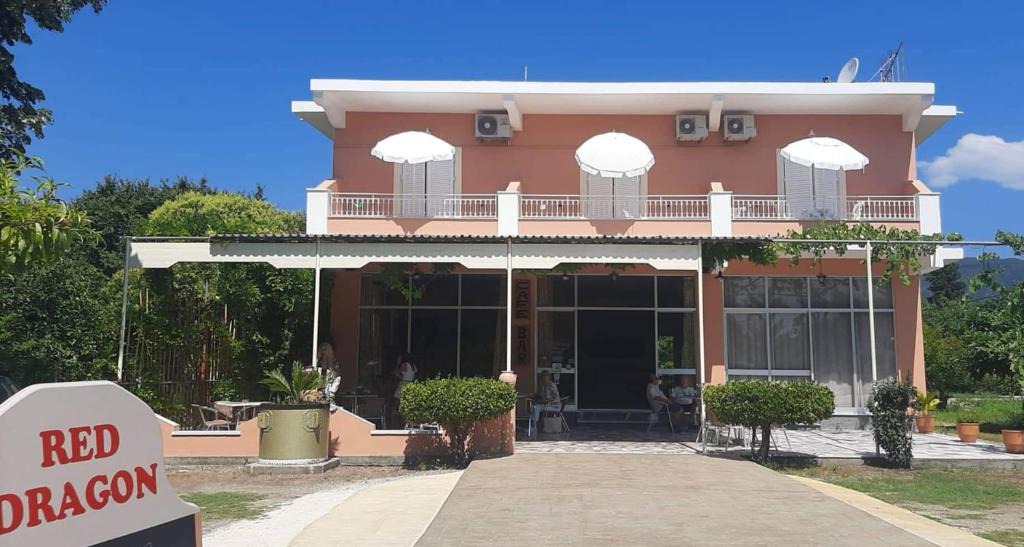Dassia House | The Red Dragon