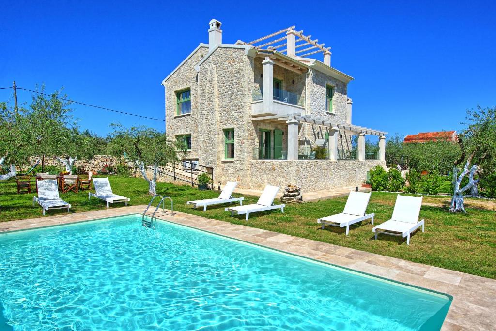 Almiros Beach Villa | Villa Elaia by PosarelliVillas