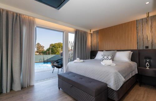 Gouvia Apartment | Daedalus Luxury Home - Seaview & Heated Pool