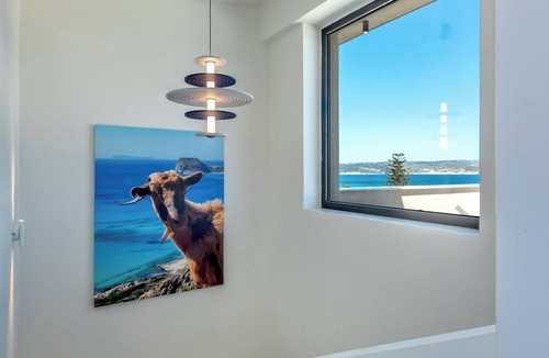 Kalyves Apartment | 2 Minute walk to the beach and supermarket, with covered parking & lift access.