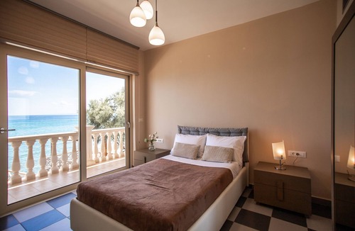 Akrotiri Villa | A stunning villa by the Ionian Sea, complete with BBQ, Jacuzzi, and more.