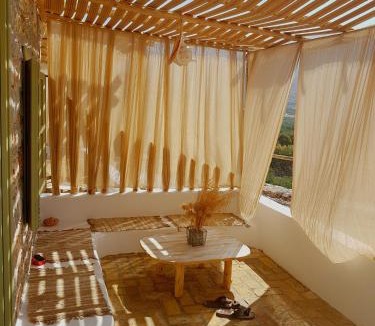 Tholaria House | Aliori art caves