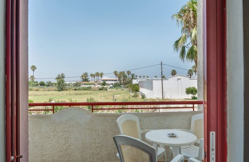 Tingaki Apartment | Apartment 'Golden Sun Two-bedroom Apt 3' with Sea View, Shared Pool and Wi-Fi