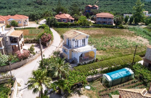 Psarou Villa | Beachfront private villa Gousetis