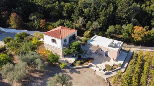 Kos House | Chaihoutes stone House and Villa into Olive farm in Zia