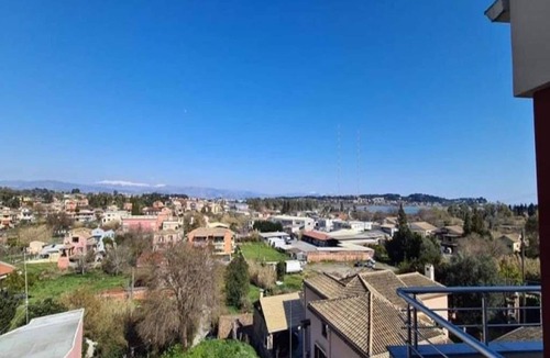 Perama Apartment | Cosy holiday home in Benitses with outdoor pool