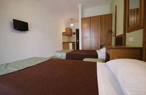 Achilleio Hotel | Cozy Coastal Hideaway at Irene Apartments – Steps from Agios Gordios Beach