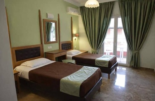 Achilleio Hotel | Cozy Coastal Hideaway at Irene Apartments – Steps from Agios Gordios Beach