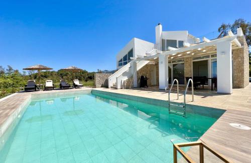 Roda Villa | Danune Luxury Beachfront Villa with private pool by DadoVillas