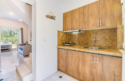 Agios Gordios Apartment | Doliva Anthi Apartment with Private Hot Tub, Mountain View, Wi-Fi, and Air Conditioning