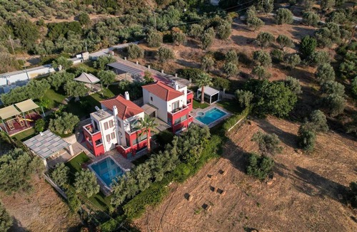 Xiro Chorio Villa | Family Villas Magic Media Resort with Private Heated Pool, Playground, Basketball & Game Room