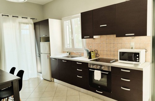 Kalami House | Gemütliches Olympia Apartment mit Pool by Interhome