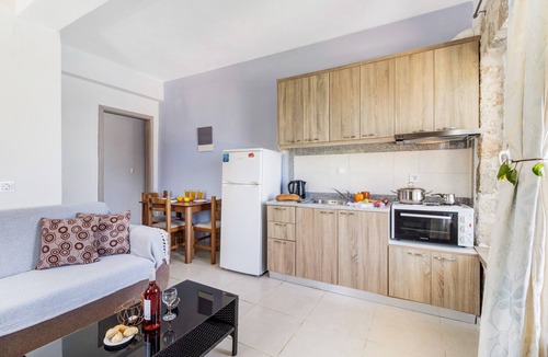 Kavallos Apartment | Gkountis Stone Apartment 5: Sea View, Shared Pool & Wi-Fi