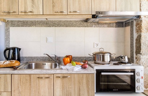 Kavallos Apartment | Gkountis Stone Apartment 5: Sea View, Shared Pool & Wi-Fi