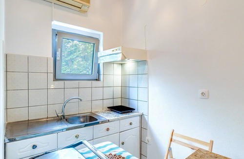 Ag. Georgios House | Holiday Home 'Pleasure Corfù Octopus' with Private Terrace, Wi-Fi and Air Conditioning