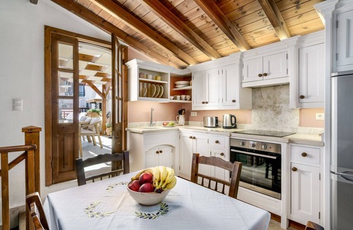 Panormos Villa | Kamares Villa, a 1912 stonebuilt estate with heated pool!