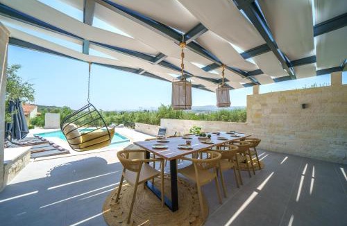 Adele Villa | Lefkothea Villas with Large Pool, BBQ & Playground by Rentado