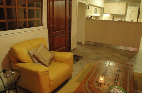 Saronida Apartment | Lovely 2-bed Apt with patio 5 mins to the Beach Family friendlyAptFenced garden