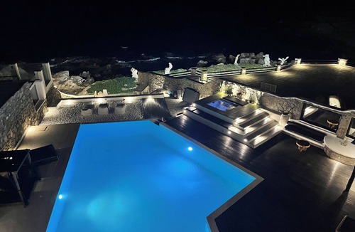 Agios Ioannis Villa | Luxurious Sunset Sea Front 5 Master bedroom villa with exterior hot tub.