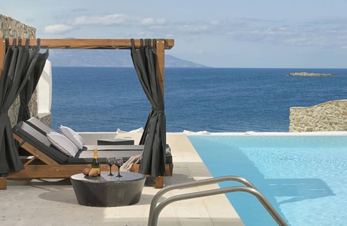 Agios Ioannis Villa | Luxurious Sunset Sea Front 5 Master bedroom villa with exterior hot tub.