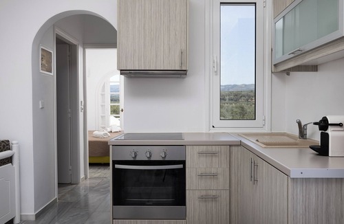 Sfakaki Apartment | Modernist Apartment With Spa Bath at Grambella Olive Estate, Grambella Residence