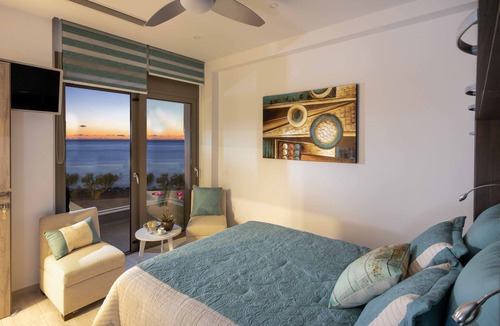 Koutsouras Condo | Moonlight villa condo at water's edge