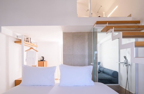 Oia Hotel | Muses Cycladic Suites - Arched Sea View Loft Suite with Seasonal Hot Tub