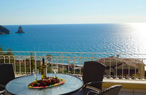 Agios Gordios Apartment | Natalia Apartment A with panoramic sea views of Agios Gordios bay