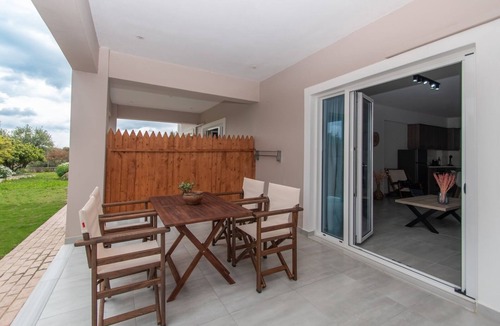 Alonia Apartment | Nestled on the ground floor with direct garden access amidst olive trees