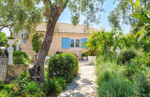 Mpogdanatika Villa | Renovated Cottage with Superb Views & Garden near Gaios and Beaches