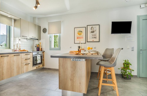 Kourkoumelata Apartment | Rose Garden Home Apartment with Balcony, Wi-Fi, and Air Conditioning