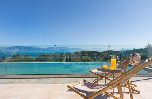 Dassia Villa | Secluded Elegance at Villa Giem | 4 Bedrooms | Unmatched Sea Views | Private.