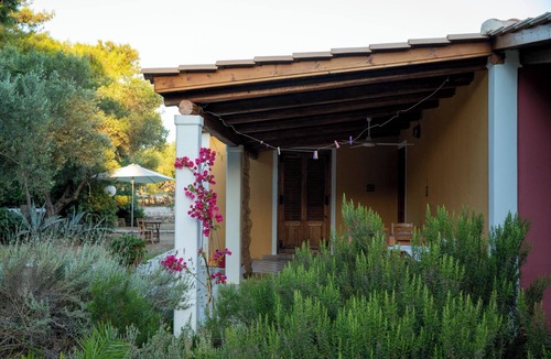Vasilikos Cottage | Self catered Daphnes cottage #3 with large veranda and garden near the beach.