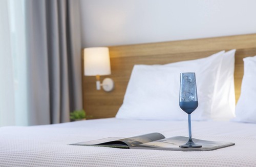 Nidri Hotel | Smile Inn Luxury Accommodation In the center of Nidri, next to the sea