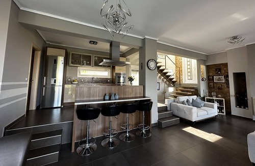 Kassandra Villa | Sunrise Villa A spacious modern villa located on a hilltop.