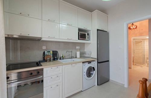 Paralia Dionysiou Apartment | Thanos and Sofia by RentalsPro