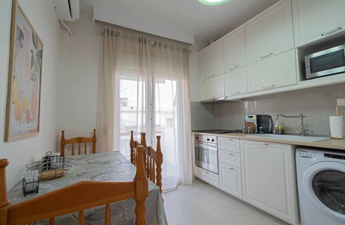 Paralia Dionysiou Apartment | Thanos and Sofia by RentalsPro