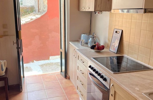 Karousades Cottage | Traditional Cottage and Garden Studio with Balcony, Terrace and Views to the Sea