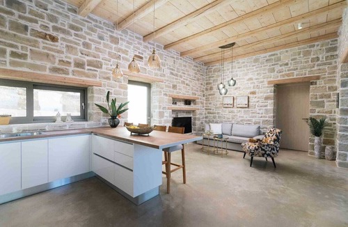 Sivas Villa | Triades Villas 1, a dream home built of natural stone with a saltwater pool, set in a peaceful setting