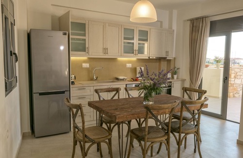Panormos Villa | Villa Louisa by the sea,heated pool, walking distance from sea, no car needed!