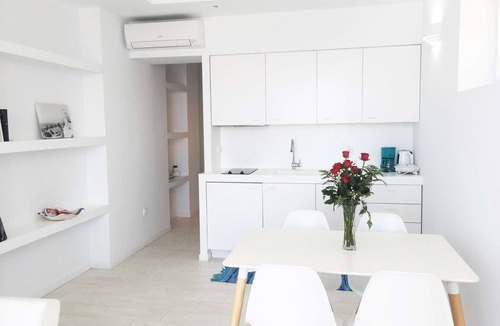 Tinos Town House | Windmill and houses by the sea // Stavros Bay