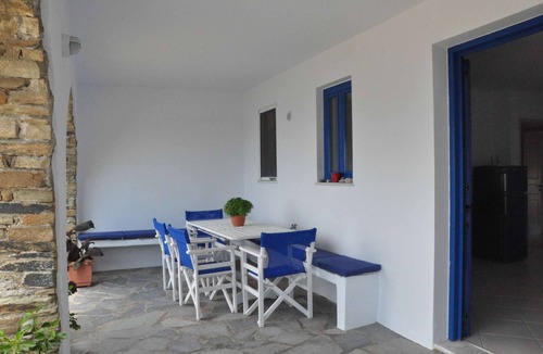 Tinos Town House | Windmill and houses by the sea // Stavros Bay