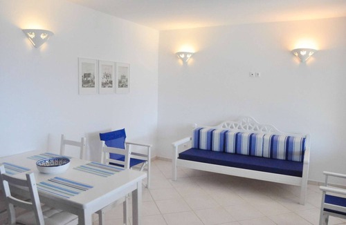 Tinos Town House | Windmill and houses by the sea // Stavros Bay